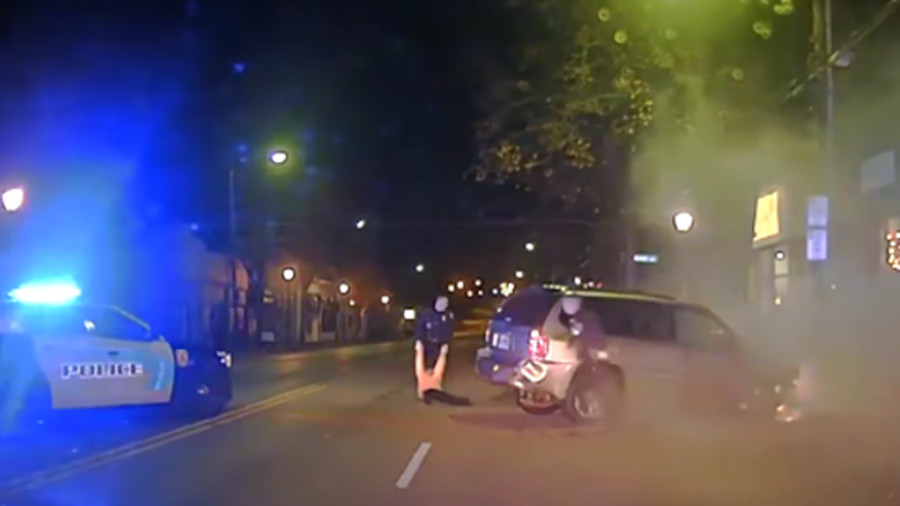 Norwood police officers pulled Ryan Brown from his burning vehicle after he wrecked it during a pursuit early Tuesday morning.