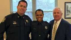 Berkeley County Sheriff's Cpl. Kimber Gist, center, is flanked by Chief Deputy Mike Cochran and Sheriff Duane Lewis on her return to full duty Tuesday. Berkeley County Sheriff's Cpl. Kimber Gist, center, is flanked by Chief Deputy Mike Cochran and Sheriff Duane Lewis on her return to full duty Tuesday.
