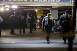 Chicago Police guard the scene of a shooting involving multiple victims, including an off-duty police officer, inside a parking garage on the 1200 Block of North State Parkway on Jan. 28. Chicago Police guard the scene of a shooting involving multiple victims, including an off-duty police officer, inside a parking garage on the 1200 Block of North State Parkway on Jan. 28.