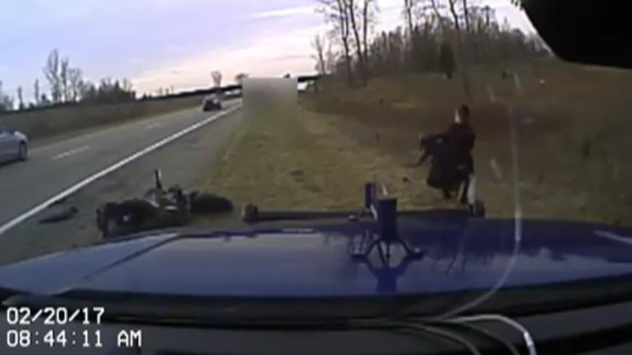 Newly released dashboard camera video shows a Michigan State Police trooper being attacked following a pursuit in February.