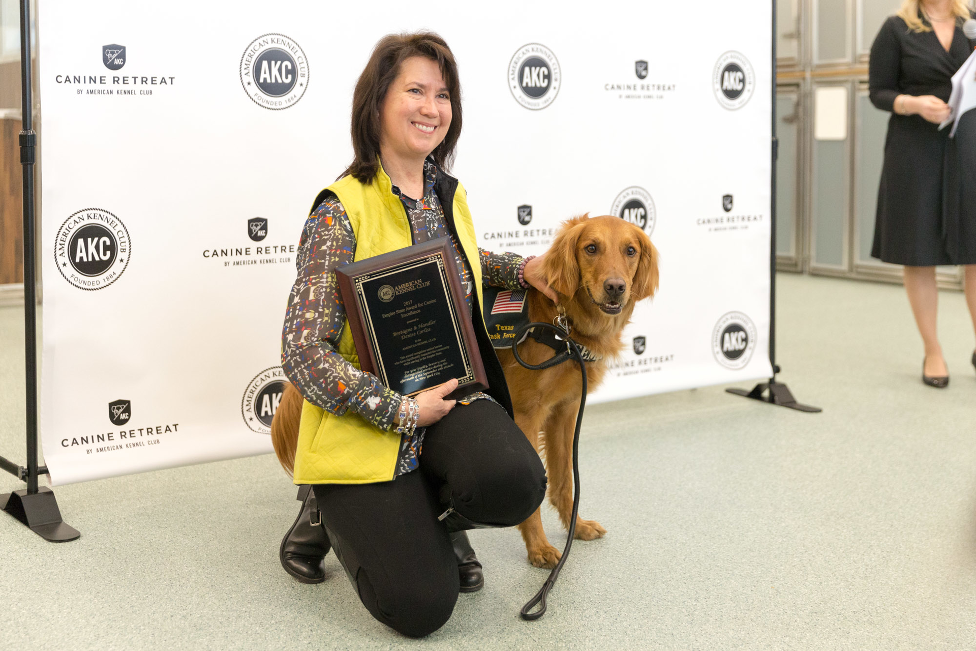 Denise Corliss accepting 2017 Empire State Award for Canine Excellence (ACE) on behalf of her fallen partner Bretagne. Denise is seen here with her current partner, Taser.