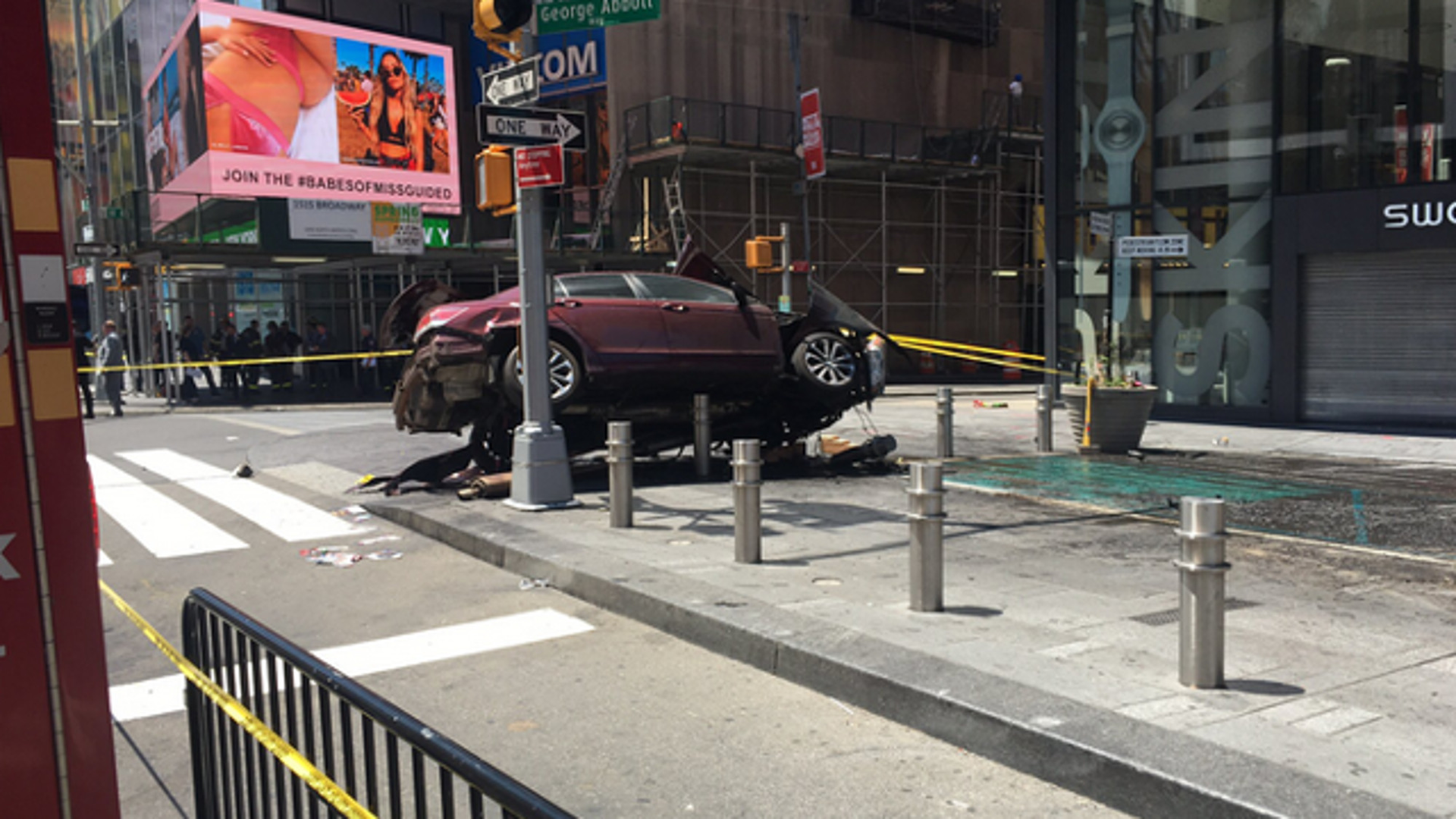 A man was arrested after he plowed through a crowd of people in Times Square Thursday, killing one and injuring more than a dozen others.