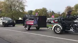 The flag-draped casket containing Buffalo Police Officer Craig E. Lehner's body was saluted by thousands of police officers from across North America during its final journey Wednesday morning. The flag-draped casket containing Buffalo Police Officer Craig E. Lehner's body was saluted by thousands of police officers from across North America during its final journey Wednesday morning.
