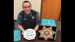 A Facebook post Monday shows Trooper Mitchell Goldman smiling while holding the white frosting cake brought to him by the unidentified deputy who shocked the trooper and a suspect at the same time last week. A Facebook post Monday shows Trooper Mitchell Goldman smiling while holding the white frosting cake brought to him by the unidentified deputy who shocked the trooper and a suspect at the same time last week.