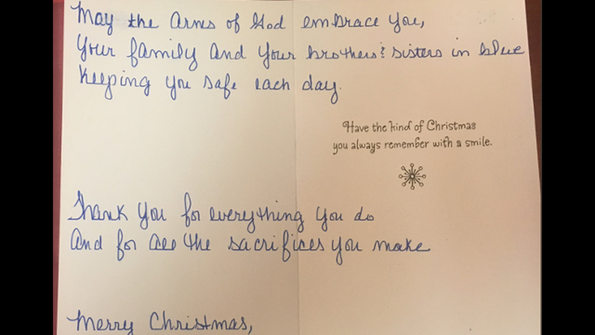 A stranger left a holiday card on a Mecklenburg County deputy&rsquo;s patrol car, and it apparently touched the entire department.