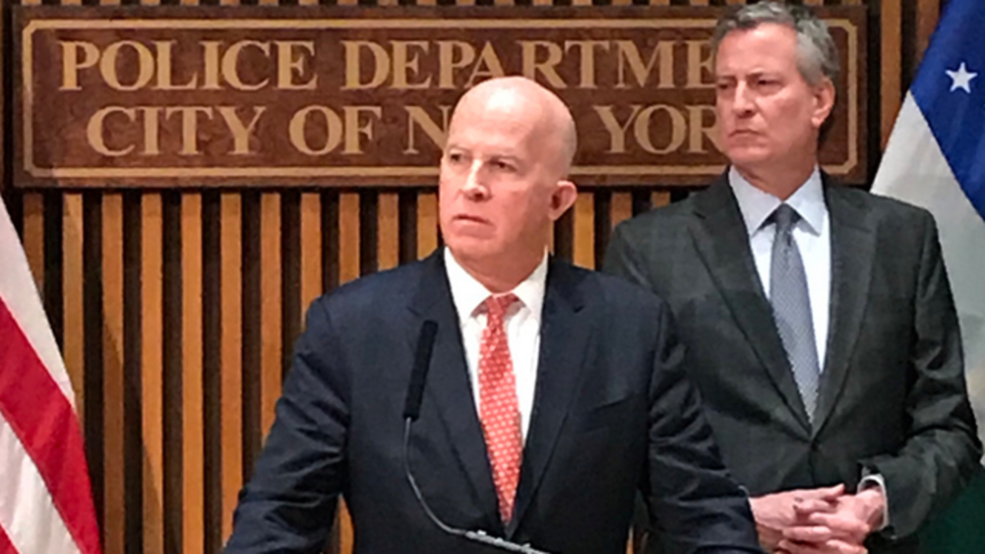 Commissioner James O'Neill announces the arrest of twin brothers after a dawn raid at their Bronx apartment.