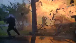 Hurst Police Officer Travis Hiser is shown being blown back, but he recovers and assists police Cpl. Ryan Tooker in getting a couple out of the home. Hurst Police Officer Travis Hiser is shown being blown back, but he recovers and assists police Cpl. Ryan Tooker in getting a couple out of the home.