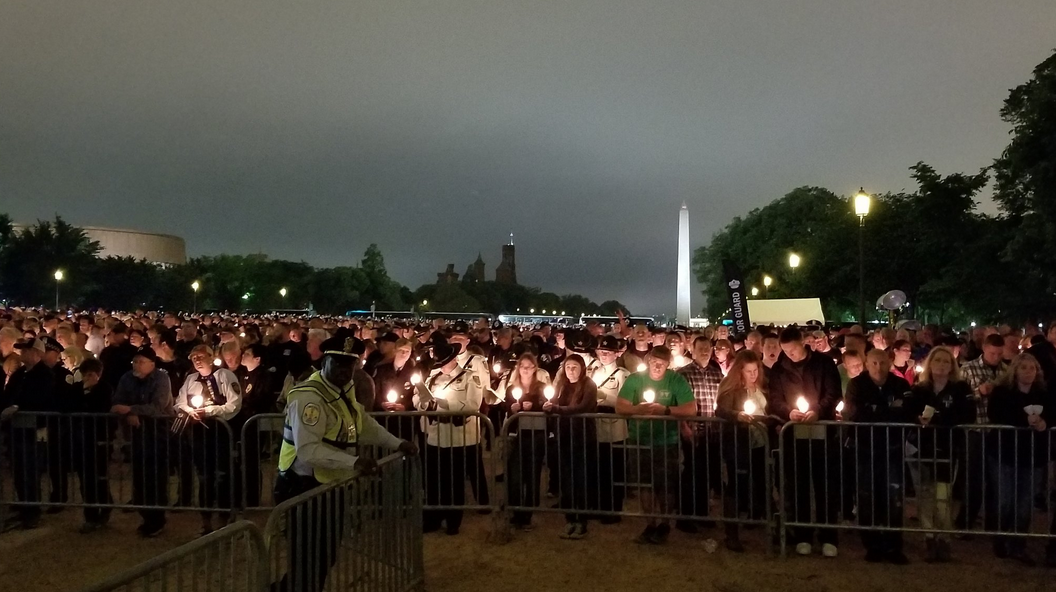 An estimated 30,000 people attended The National Law Enforcement Officers Memorial Fund's 30th annual candlelight vigil Sunday night on the National Mall in Washington, D.C.