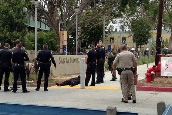 Police around the body of John Samir Zawahri after neutralizing him during his attack at the Santa Monica College Library.