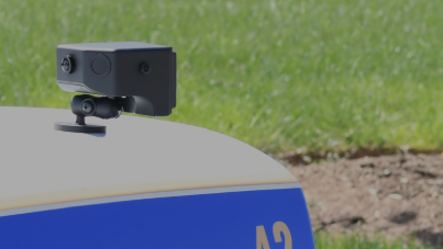 The Move Over Camera mounted on the trunk of a police vehicle.