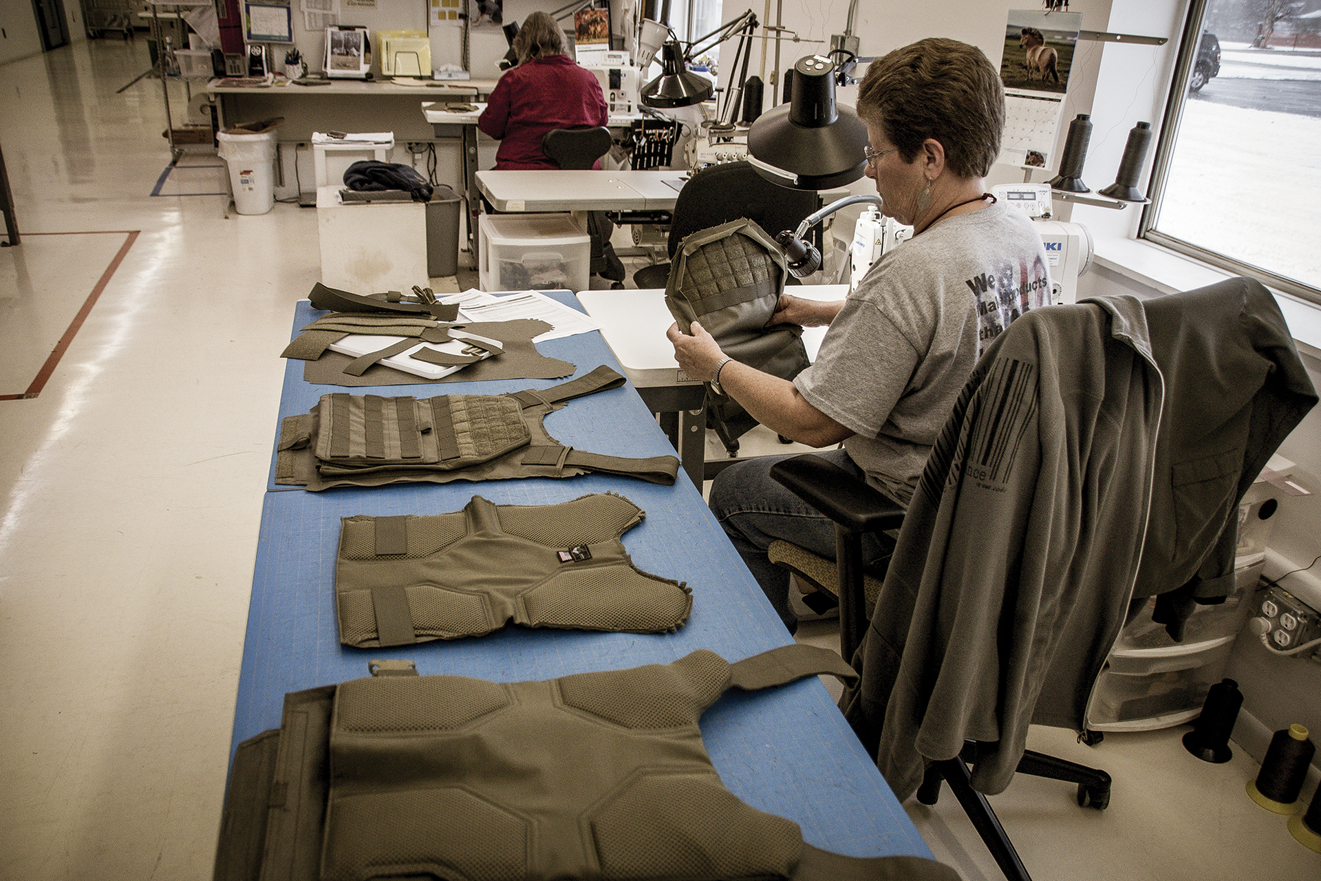 A R&D Sample Maker at Armor Express in the final phases of building a Lighthawk Tactical SAU plate carrier.