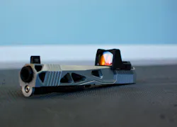 Lone Wolf Distributors built one of their custom AlphaWolf slides, complete with a mounted Trijicon RMR optic for this article. This model is “melted,” where hard edges are contoured, and the RMR is in the COMBAT position, mounted just in front of the rear sight, slightly recessed into the slide. Lone Wolf Distributors built one of their custom AlphaWolf slides, complete with a mounted Trijicon RMR optic for this article. This model is “melted,” where hard edges are contoured, and the RMR is in the COMBAT position, mounted just in front of the rear sight, slightly recessed into the slide.