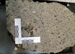 High angle impact of 45 auto on asphalt. High angle impact of 45 auto on asphalt.