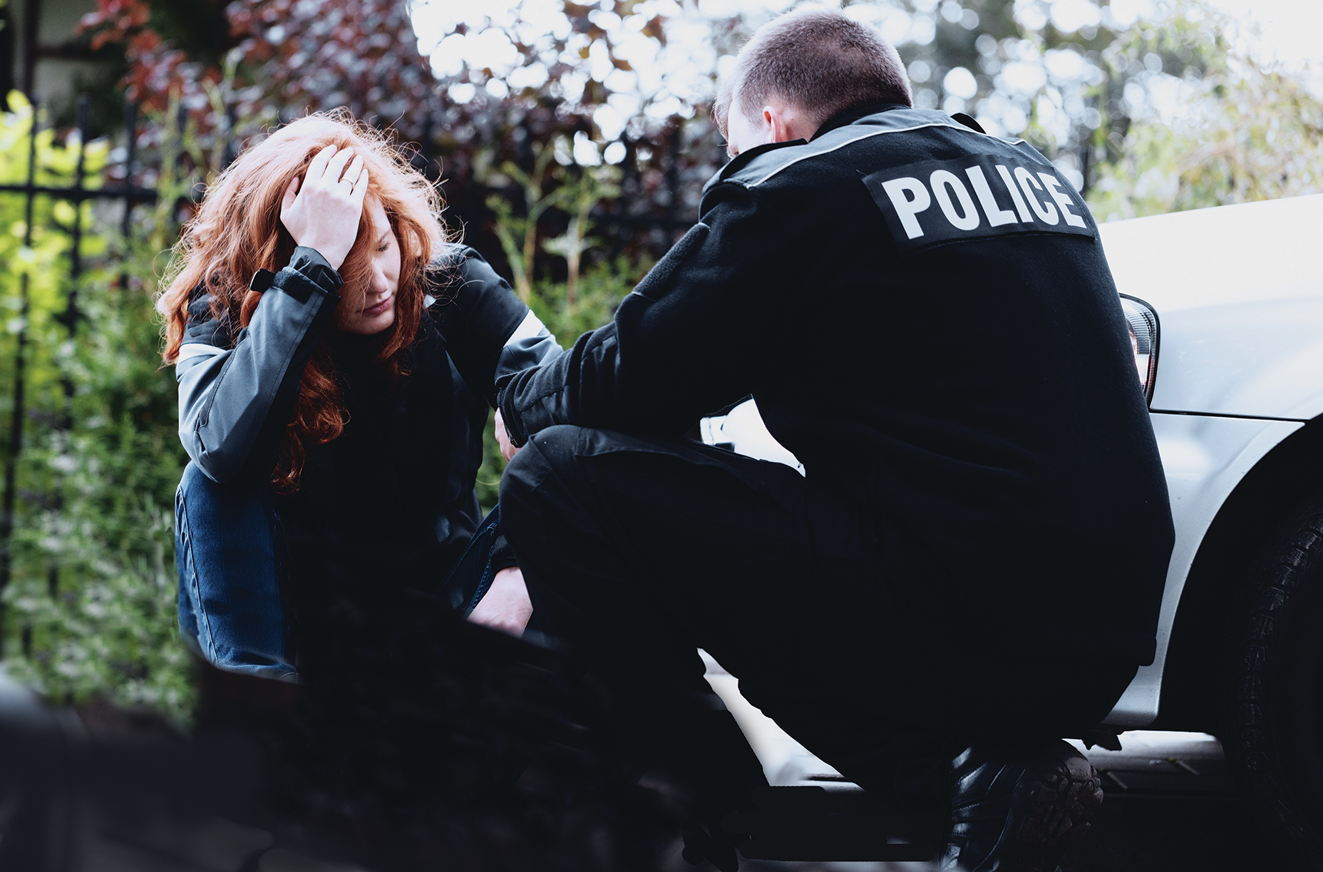Officer And Distraught Woman