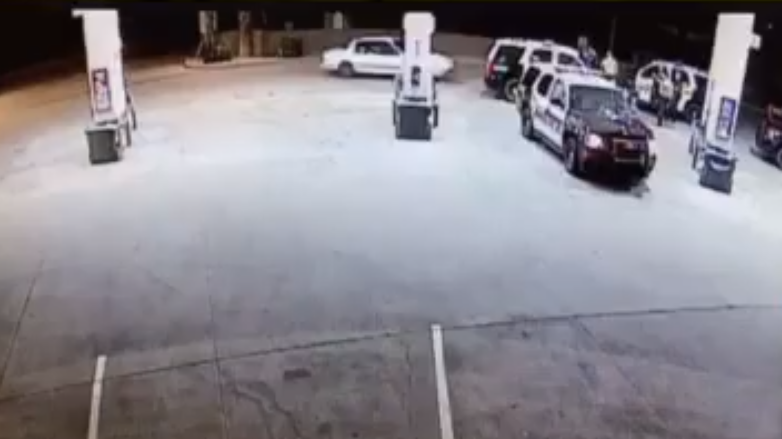 Two Maricopa County Sheriff's deputies and one Mesa police officer were injured after a vehicle plowed into them at a gas station early Thursday morning.