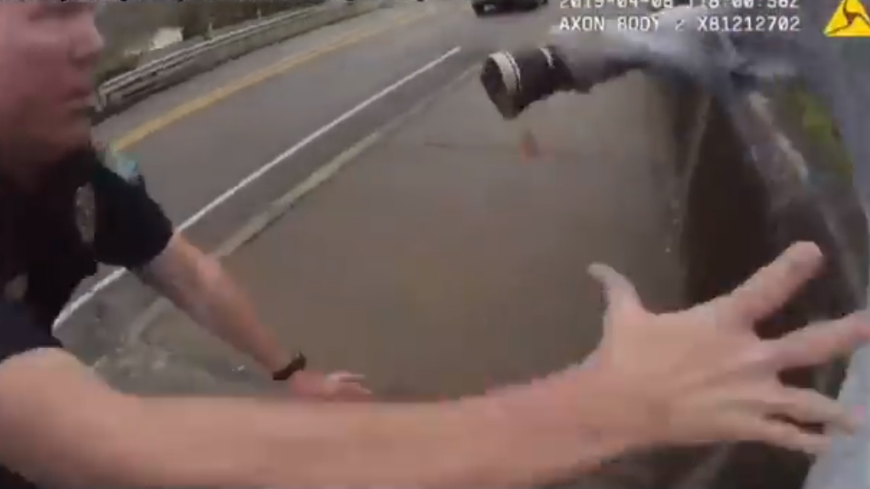 A newly released body camera footage shows a Knox County Sheriff's deputy and a Knoxville police officer save the life of a young man attempting to take his own life earlier this year.