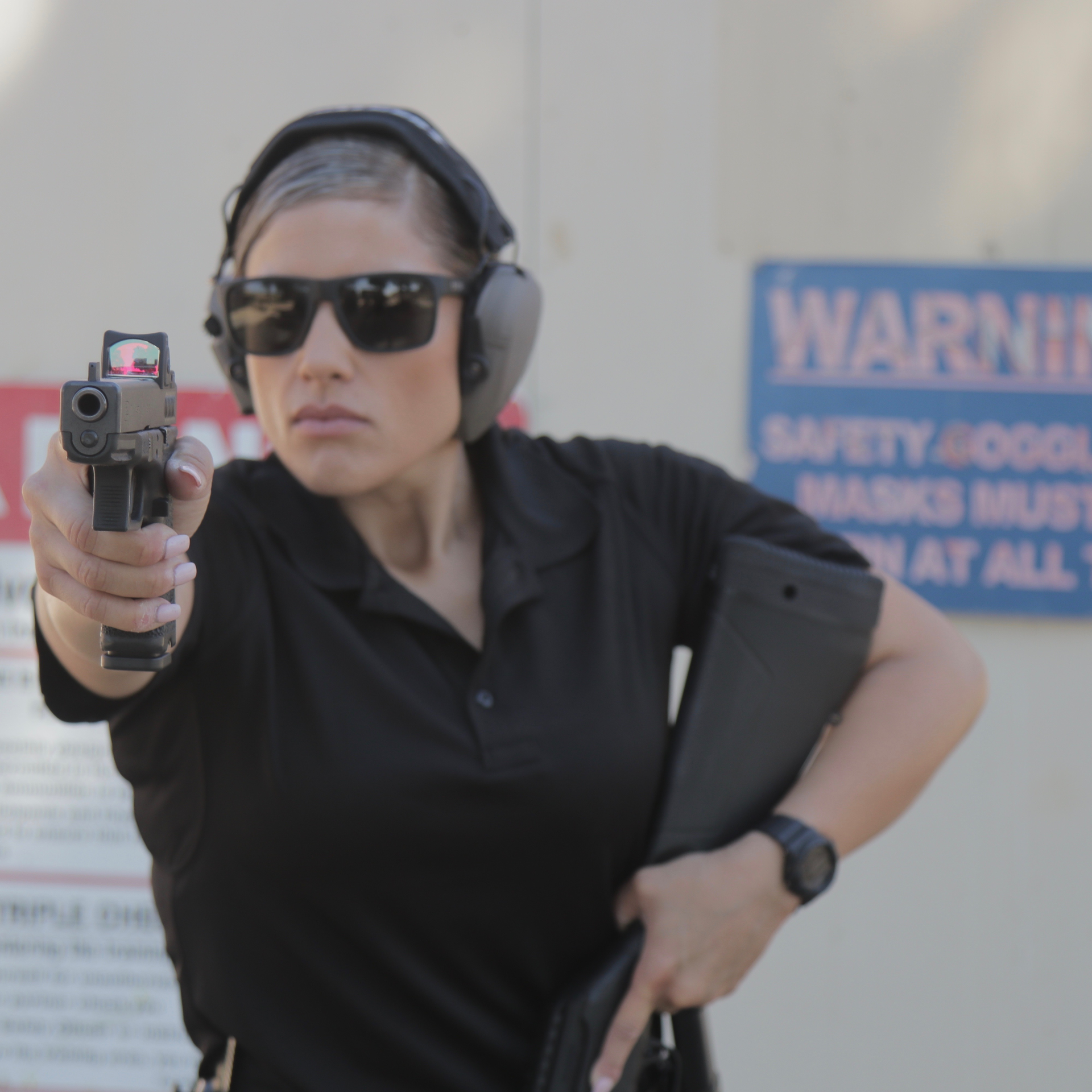 The other method of positioning a long gun without a sling is to point the barrel down, cradling the butt in the crook of the elbow.