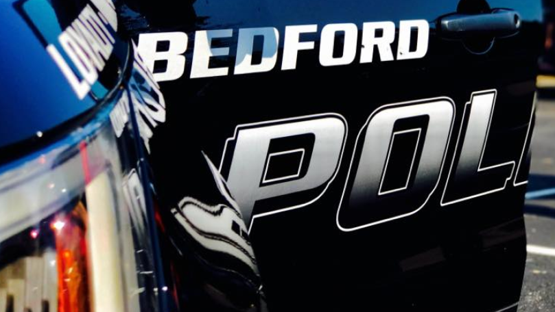 A Bedford officer shot a suspect who threatened to hurt him after a traffic stop early Wednesday morning, police said.