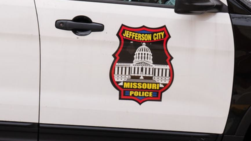 A Jefferson City police officer was saved by his ballistic vest after being shot in chest during a foot pursuit Wednesday night.