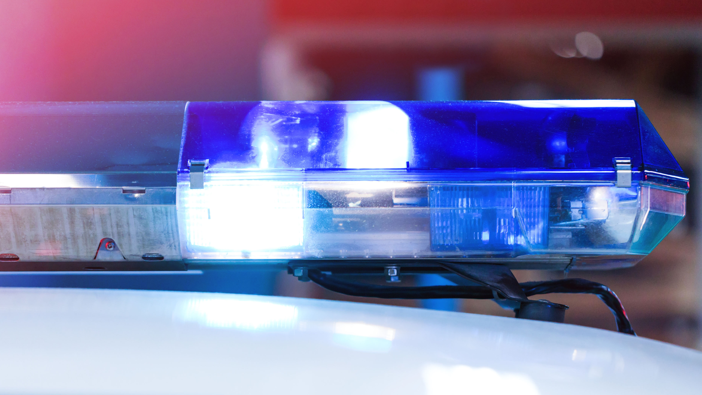 A suspect remains at large after shooting at police officers during a routine traffic stop in New Zealand on Friday, June 19, 2020, killing one and seriously injuring the other.