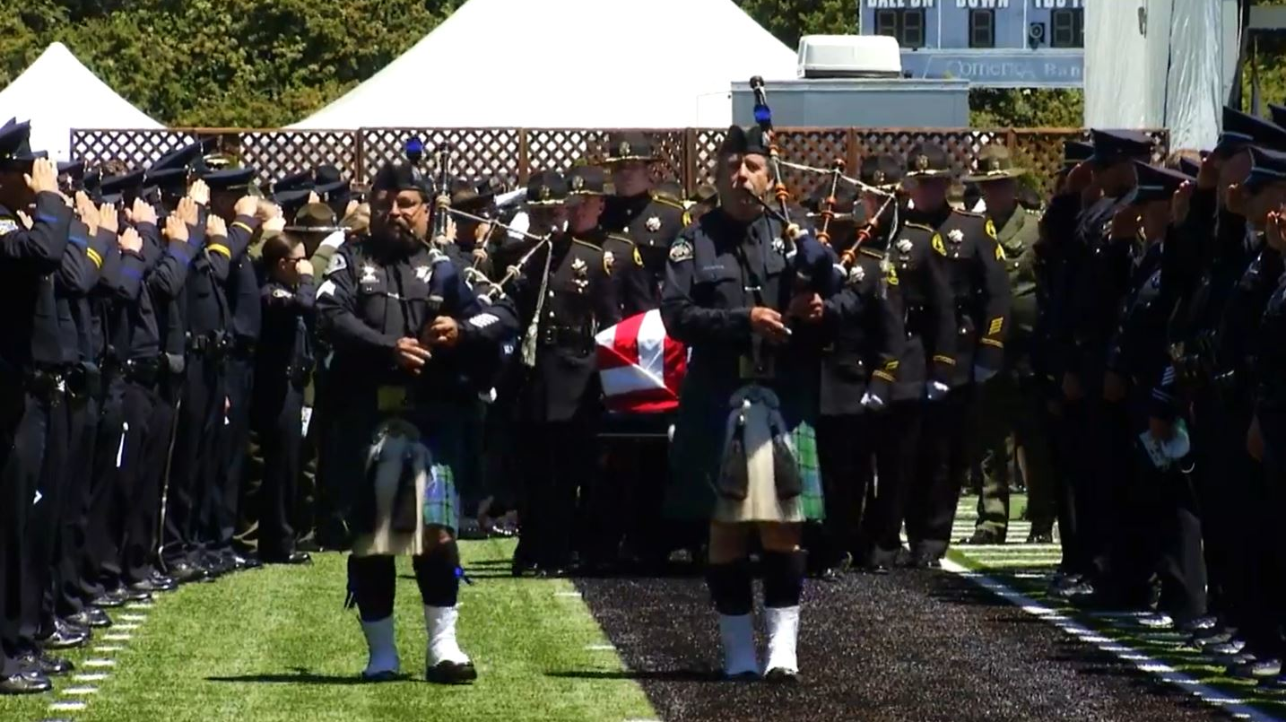 Good-natured, devoted to his family, rock-steady on the job and a shining example of a deputy &mdash; so Santa Cruz County Sheriff&rsquo;s Deputy Sgt. Damon Gutzwiller was remembered at a memorial ceremony Wednesday at Cabrillo College.