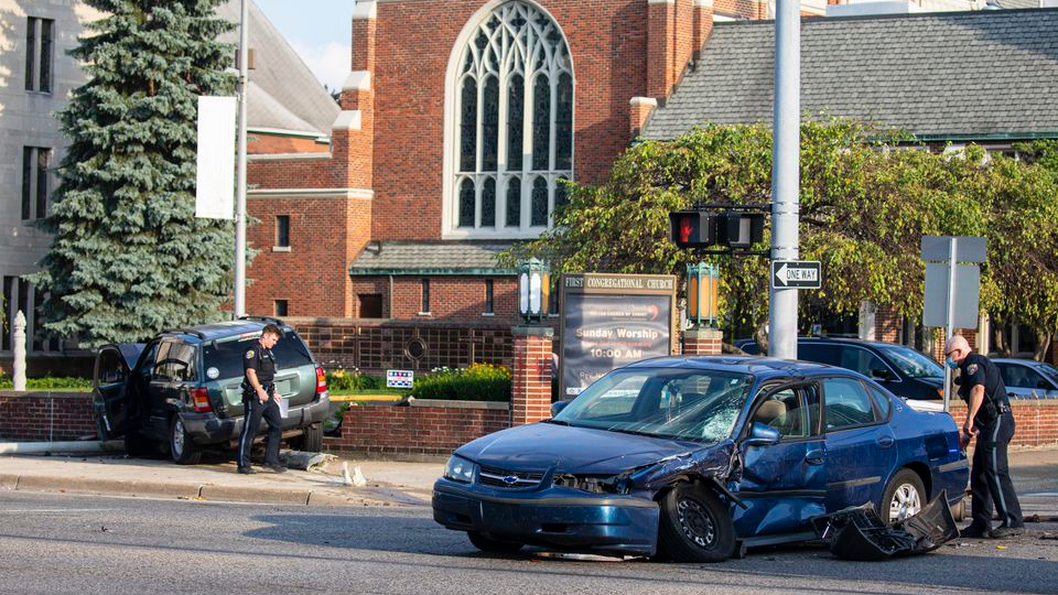 The scene where a a gray Jeep that was fleeing a police traffic stop collided with a vehicle at the intersection of West Michigan Avenue and North Park Street in Kalamazoo, Michigan on Sunday, July 26, 2020.