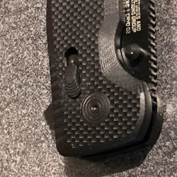 The XR Locking mechanism is a spring-loaded slide button. The thumb-stud optional opening devices are ambidextrous. The XR Locking mechanism is a spring-loaded slide button. The thumb-stud optional opening devices are ambidextrous.