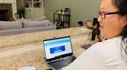 Former incarcerated individual Amy Yang working on her Lantern studies on her computer. Former incarcerated individual Amy Yang working on her Lantern studies on her computer.