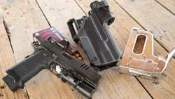 Since the T Series Holster is open on the bottom, it can handle some accessories like compensators and threaded barrels. Shown here is a Staccato XC, basically a Staccato P with an integrated compensator and a Leopold Delta Point Pro. Notice the extended 20 round magazine. This gives the Staccato P an awesome balance for quick shot strings. Since the T Series Holster is open on the bottom, it can handle some accessories like compensators and threaded barrels. Shown here is a Staccato XC, basically a Staccato P with an integrated compensator and a Leopold Delta Point Pro. Notice the extended 20 round magazine. This gives the Staccato P an awesome balance for quick shot strings.