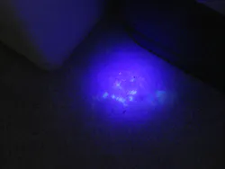 Evidence that cannot be seen with the naked eye is illuminated under an alternative light source such as a UV light. Evidence that cannot be seen with the naked eye is illuminated under an alternative light source such as a UV light.