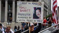 A protester holds a sign about Ashli Babbitt while participating in a political rally on July 25 in New York City. A protester holds a sign about Ashli Babbitt while participating in a political rally on July 25 in New York City.