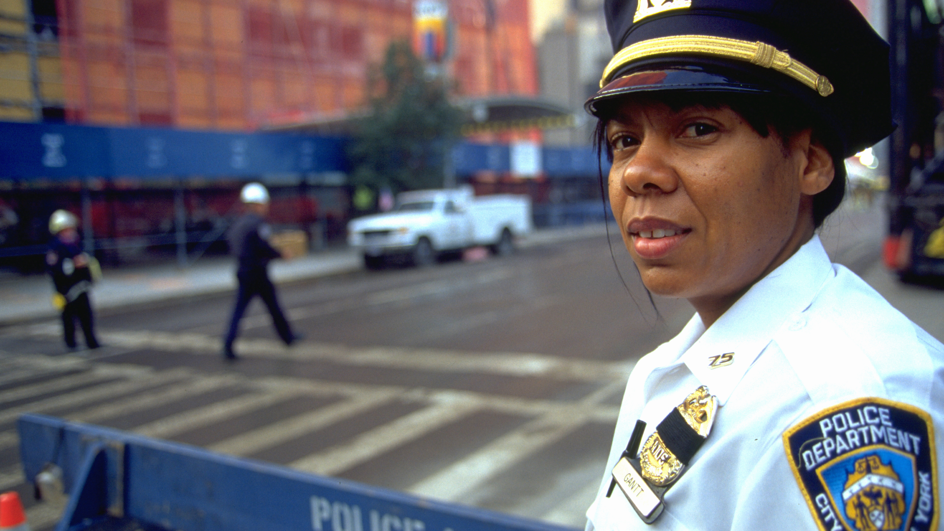 NYPD officers help keep order at the World Trade Center in New York City on September 27, 2001.