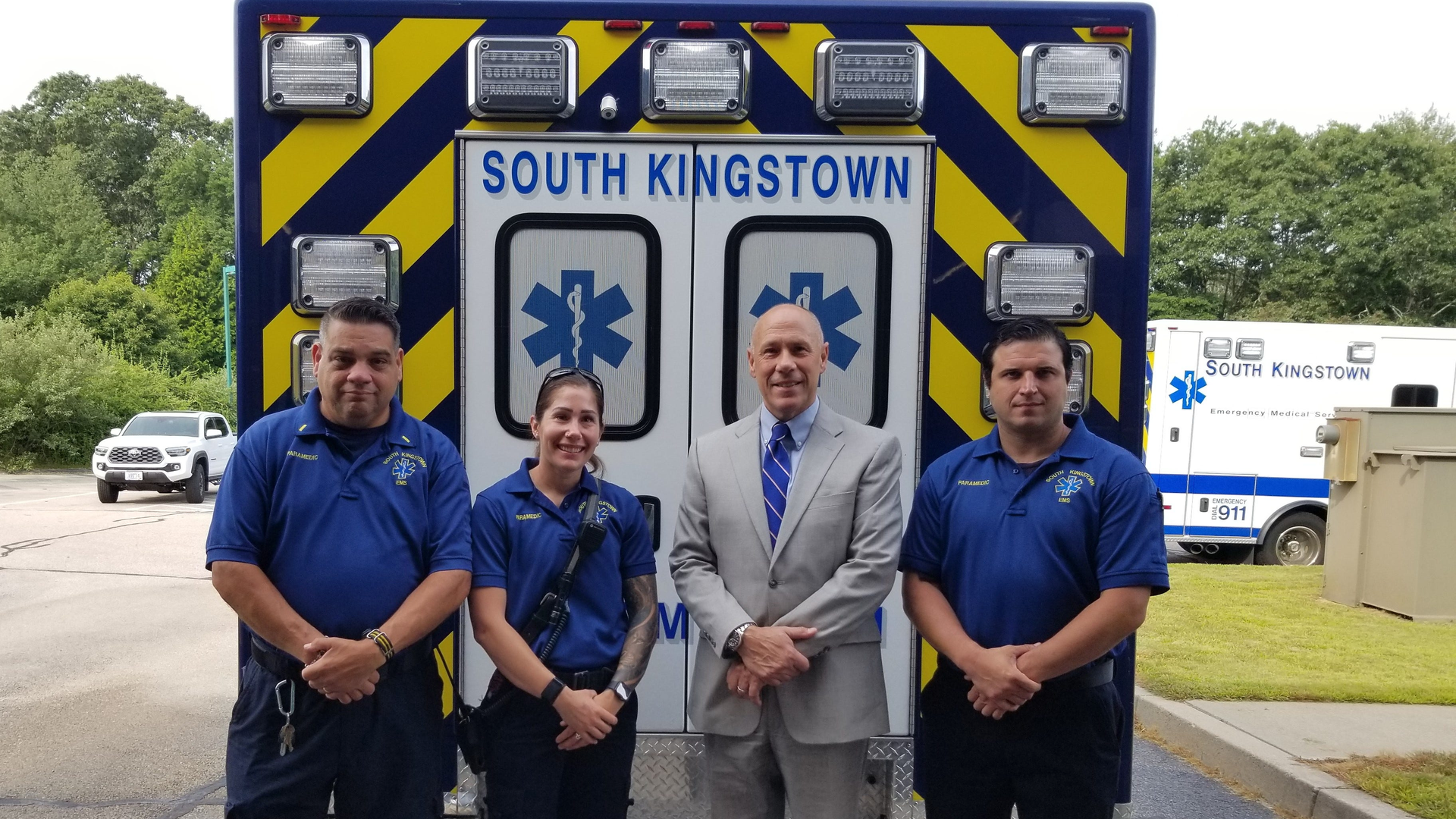 Rhode Island State Police Col. James Manni (center) with South Kingstown EMS Capt. Frank Capaldi (far left) and paramedics Sarah Peet and Keith DeCesare.
