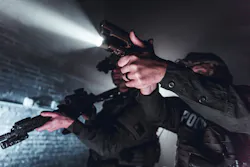 Weapon-mounted lights have gradually become the norm. Pictured here is the Streamlight TLR-VIR II mounted on both a pistol and a long gun. Weapon-mounted lights have gradually become the norm. Pictured here is the Streamlight TLR-VIR II mounted on both a pistol and a long gun.