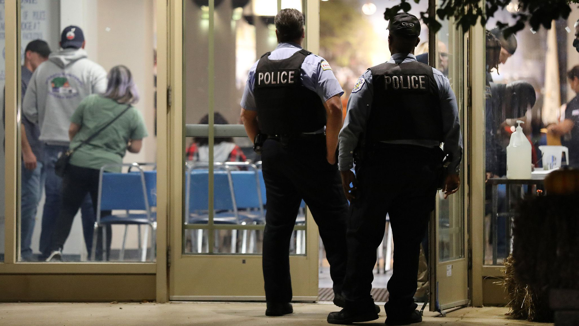 In this file photo, police officers arrive for a meeting at the Fraternal Order of Police Lodge 7 in Chicago on Wednesday.