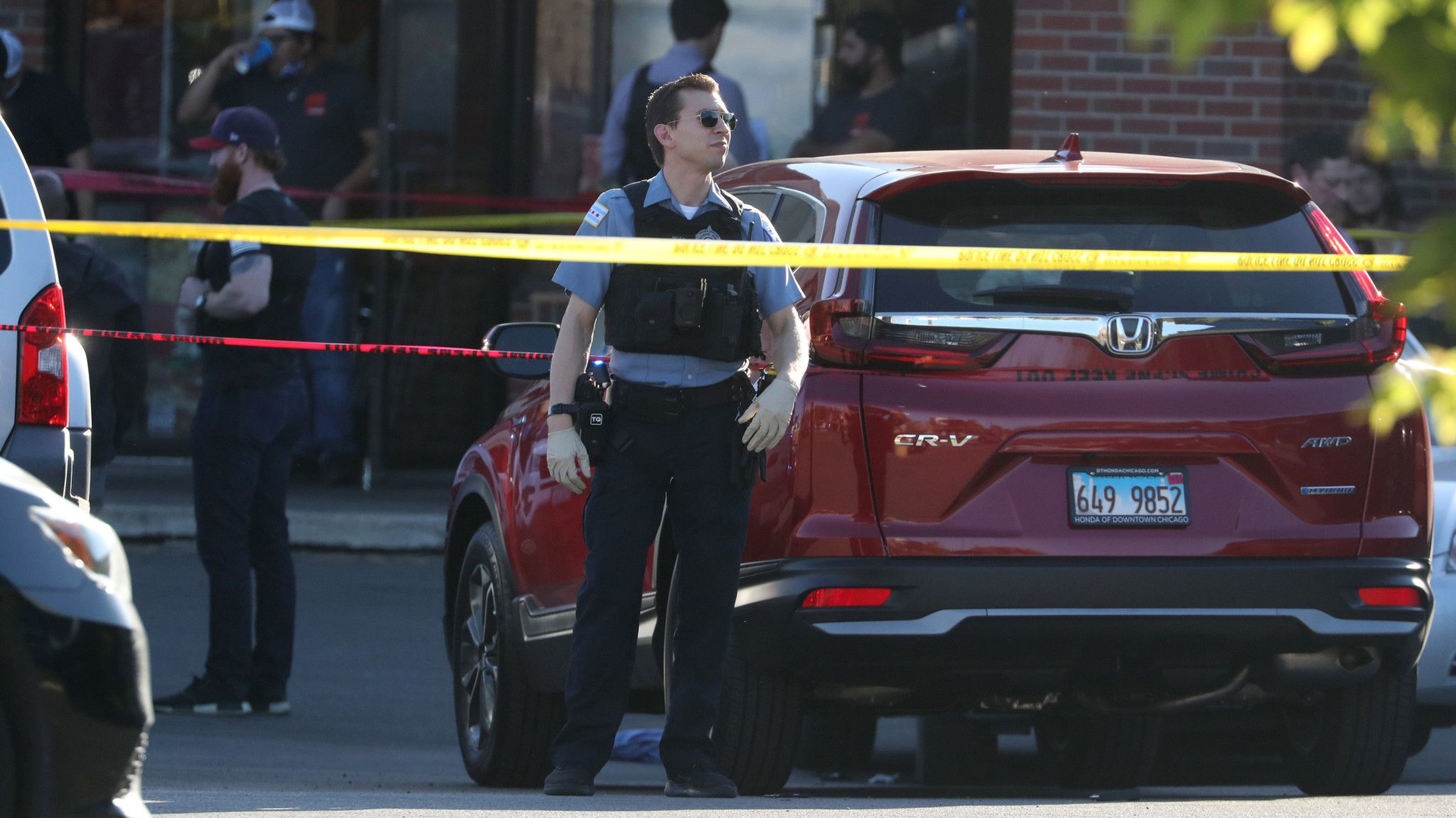 A Chicago police officer at the scene where an officer was shot Monday.