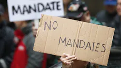Members and supporters of the Fraternal Order of Police rally outside of City Hall in Chicago against the vaccine mandate for city workers Oct. 25. Members and supporters of the Fraternal Order of Police rally outside of City Hall in Chicago against the vaccine mandate for city workers Oct. 25.