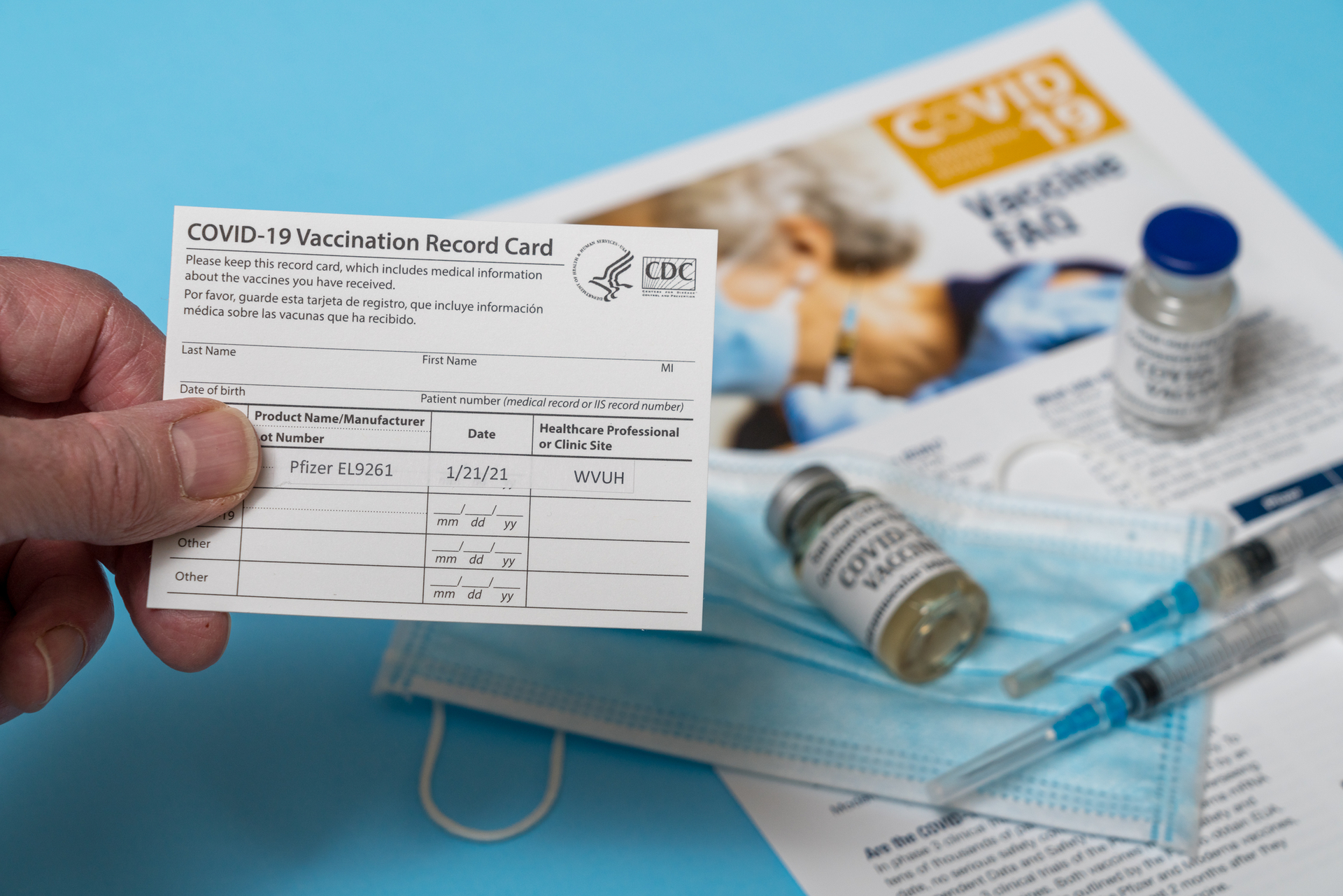 A COVID-19 vaccination record card showing a first dose of the Pfizer vaccine in January in Morgantown, WV.