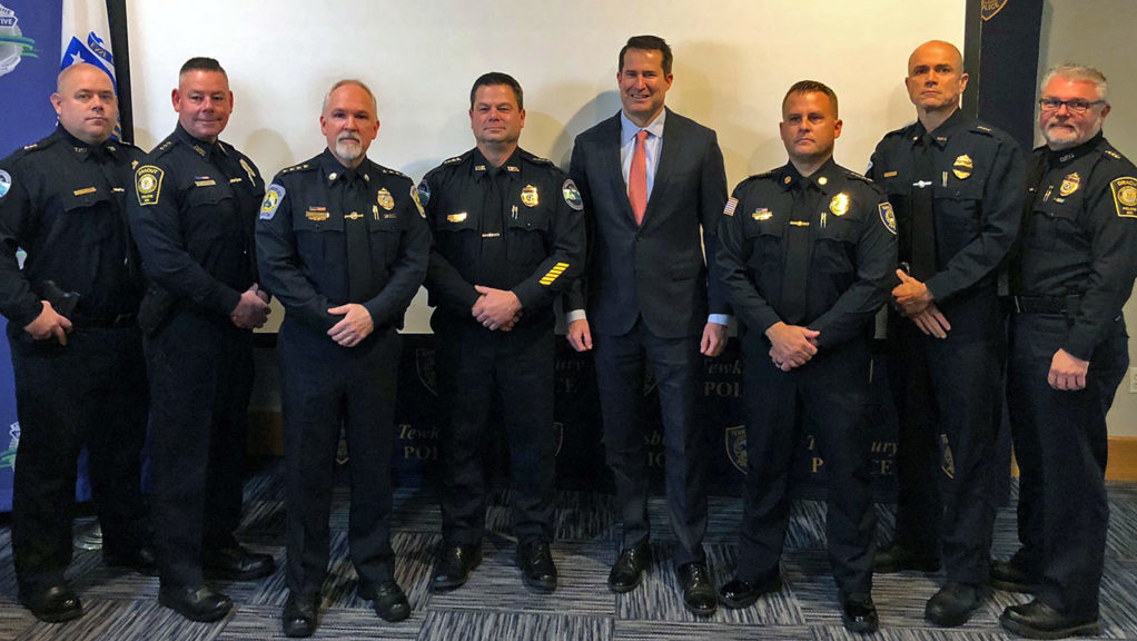 U.S. Rep. Seth Moulton (center right) meets with members of the Massachusetts police departments partnering with the Front Line Initiative, including (from left) Tyngsborough Police Deputy Chief Shawn Woods, Dracut Deputy Chief David Chartrand, Chelmsford Police Chief James Spinney, Tyngsborough Police Chief Richard Howe, Tewksbury Police Chief Ryan Columbus, Billerica Police Deputy Chief Roy Frost, and Dracut Police Chief Peter Bartlett.