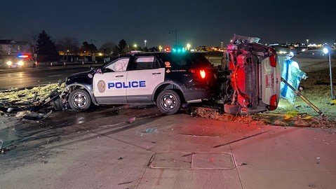 The passenger in a stolen car was killed early Wednesday when the vehicle ran through a red light and collided with a Westminster, CO, Police Department SUV. The driver of the stolen vehicle was taken to the hospital with serious injuries, and the officer and his civilian passenger suffered minor injuries.