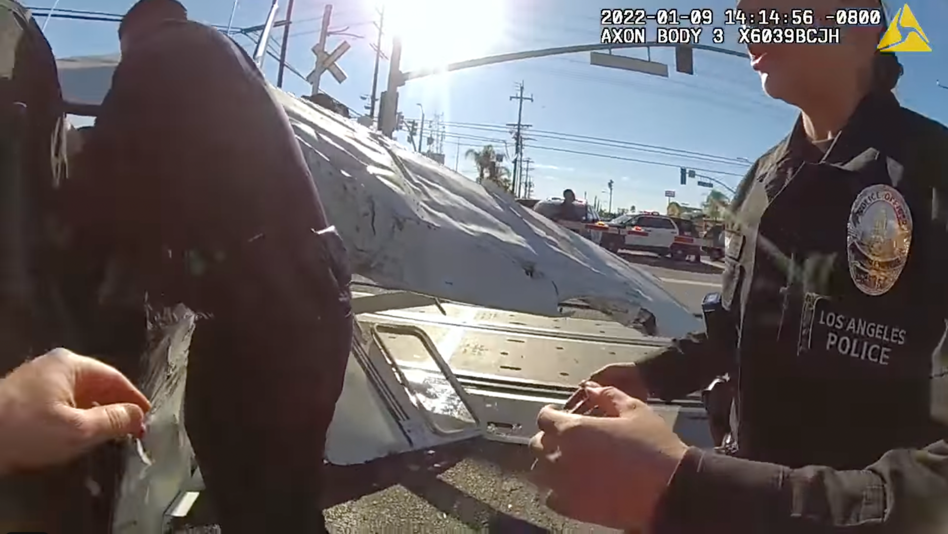 LAPD officers rescued a pilot from his crashed single-engine Cessna just seconds before a train slammed into it Sunday.