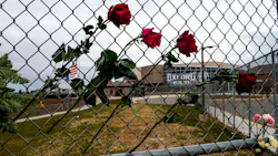 Four roses are placed on a fence outside Oxford, MI, High School to honor the four teens killed in a shooting at the northern Oakland County school Nov. 30. Four roses are placed on a fence outside Oxford, MI, High School to honor the four teens killed in a shooting at the northern Oakland County school Nov. 30.