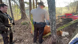 Three Pickens County, GA, deputies worked for several hours to rescue a cow tangled in a fence. Three Pickens County, GA, deputies worked for several hours to rescue a cow tangled in a fence.