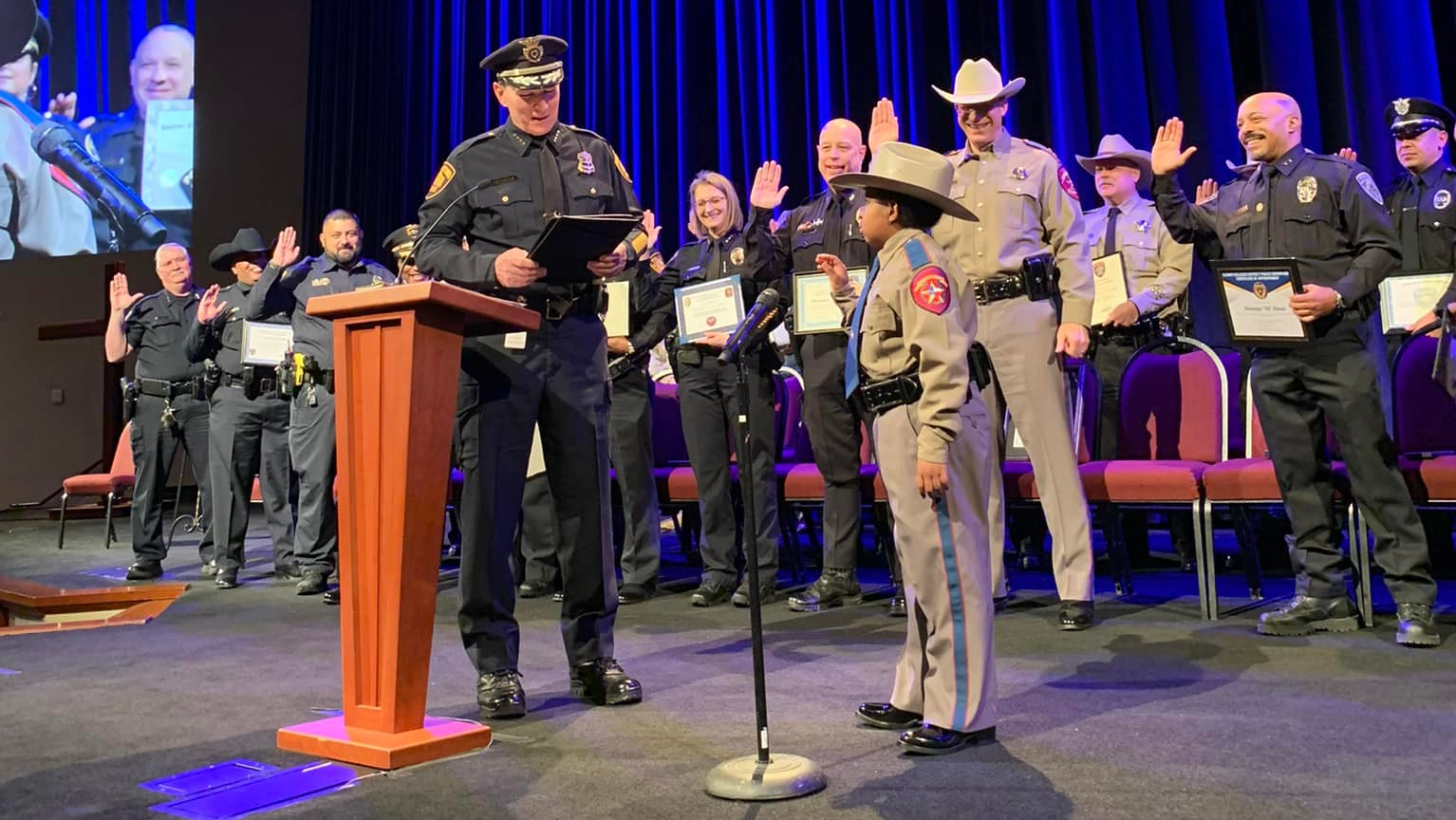 Devarjaye Daniel, who is battling terminal brain and spine cancer, became an honorary member of the San Antonio Police Department on Monday as part of his quest to join as many law enforcement agencies as he can.