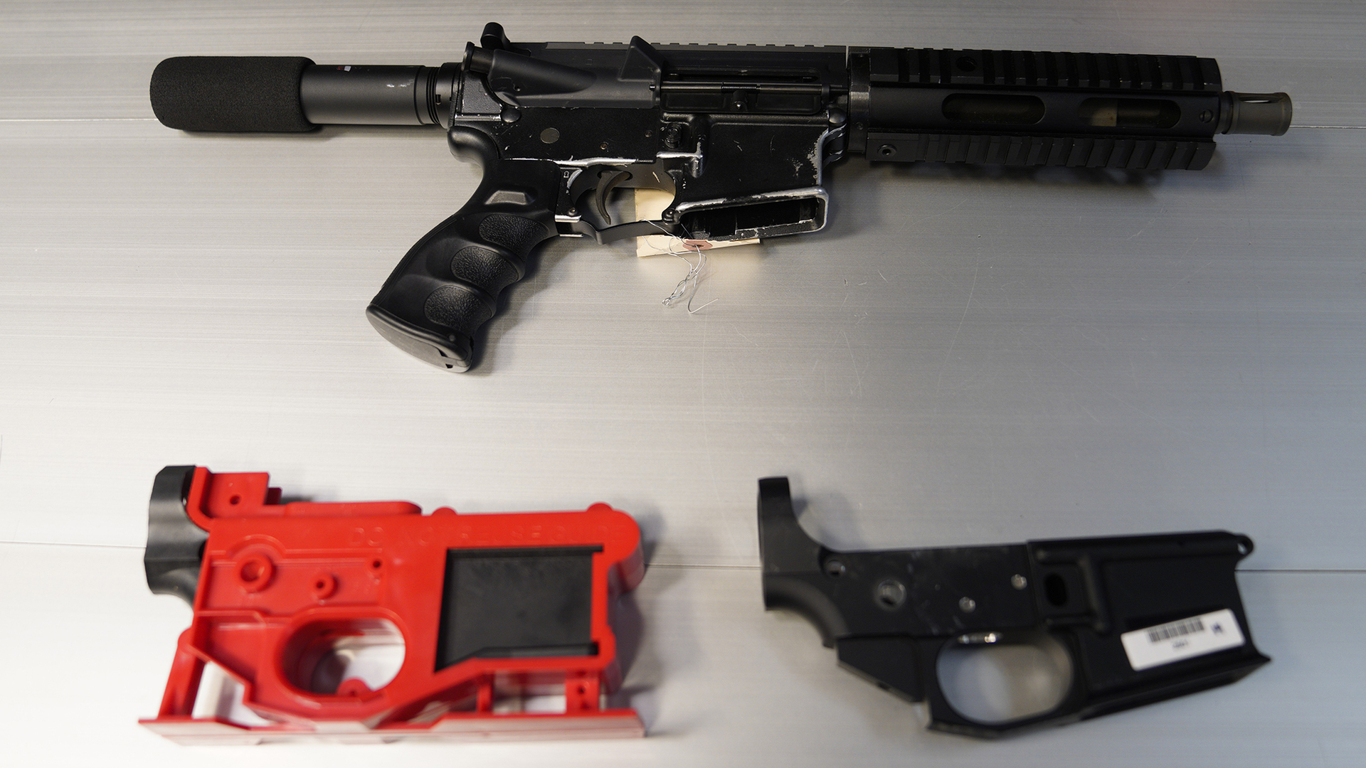 Confiscated 'ghost guns' displayed at a San Diego Police Department news conference.