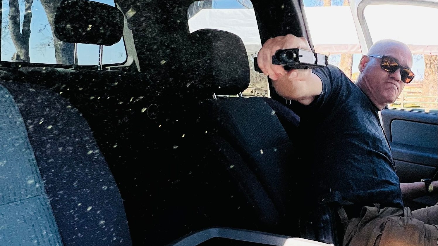 Anyone who has done a shooting investigation involving vehicle glass, or shot vehicle glass in training, knows that the entire vehicle interior is often covered with glass powder. Wear eye protection on patrol 24/7.