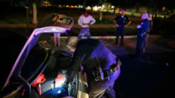 Officers from the LAPD's newly expanded Metropolitan Division, stop drivers and search their vehicles in Los Angeles in 2015. Officers from the LAPD's newly expanded Metropolitan Division, stop drivers and search their vehicles in Los Angeles in 2015.