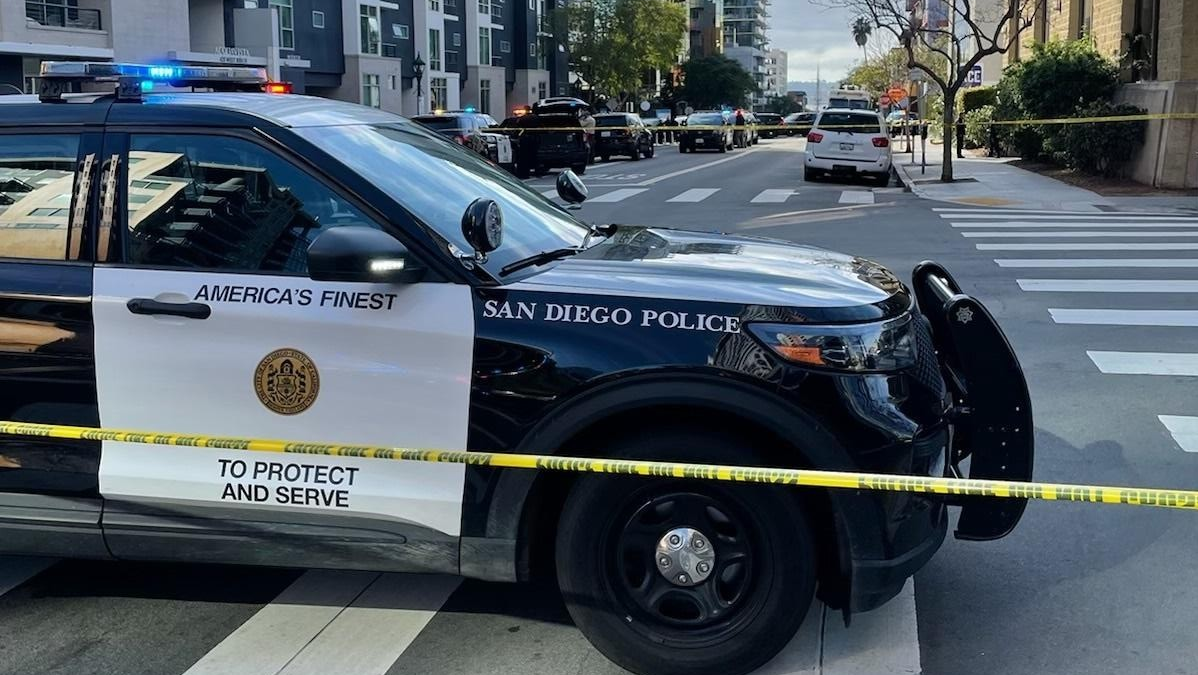 A San Diego police officer was stabbed in the chest by a woman with chef's knife after police and sheriff's deputies tried to serve an eviction notice Thursday.