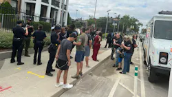 In response to a Detroit ice cream shop refusing to serve police wearing body armor, a former officer spent four hours passing out free treats Wednesday from an ice cream truck parked near the business. In response to a Detroit ice cream shop refusing to serve police wearing body armor, a former officer spent four hours passing out free treats Wednesday from an ice cream truck parked near the business.