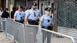 Philadelphia police officers patrol South Street on June 11, a week after a mass shooting on the popular street. Philadelphia police officers patrol South Street on June 11, a week after a mass shooting on the popular street.
